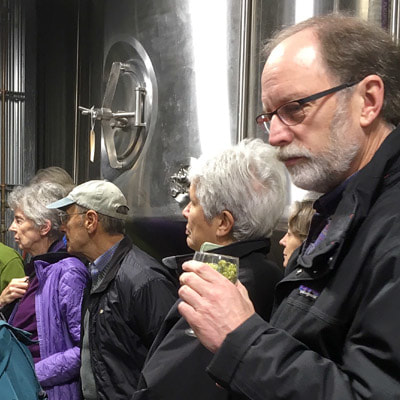 A group touring a brewery